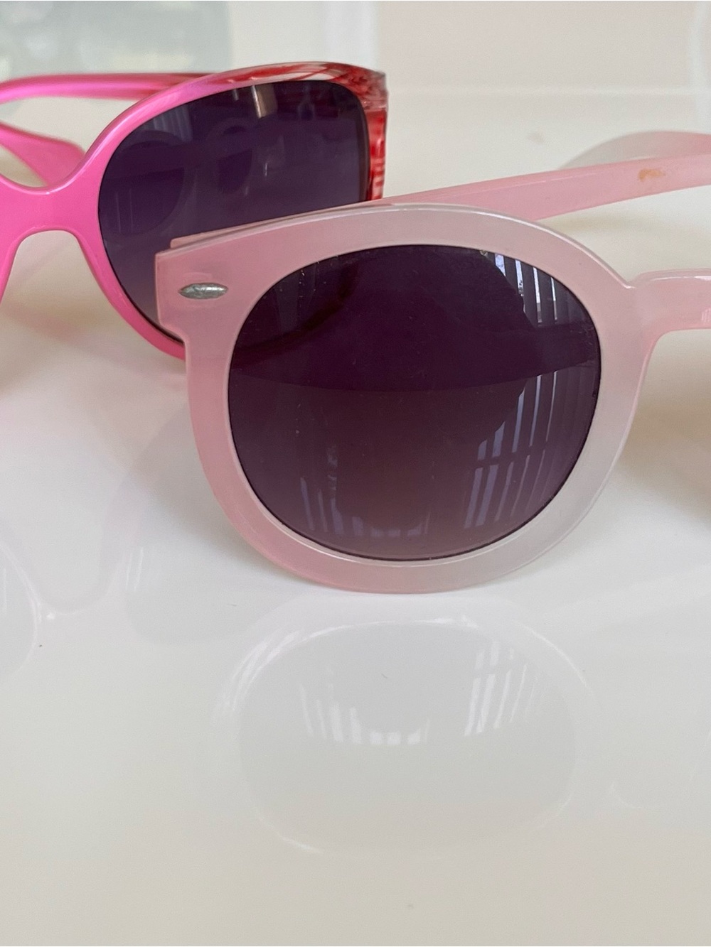 2 pairs of sunglasses